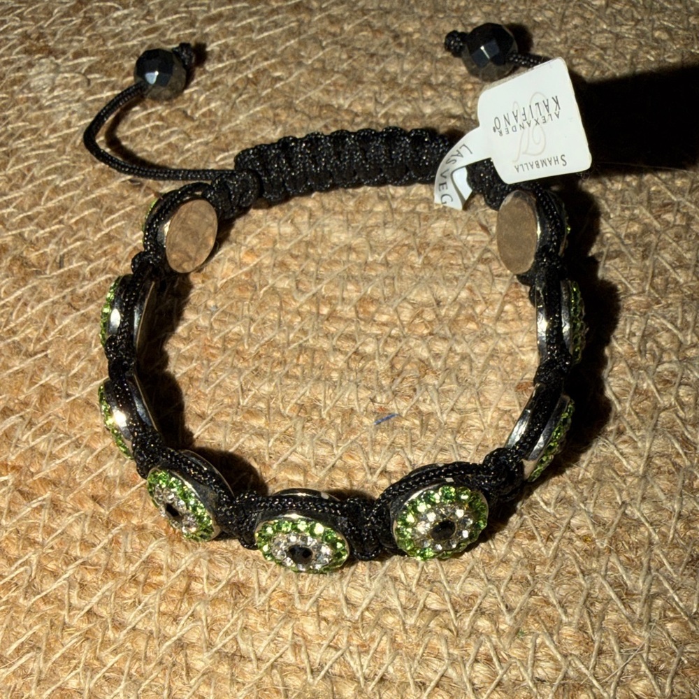 NWT Periodot Crystal Evil
Eye Shamballa Bracelet